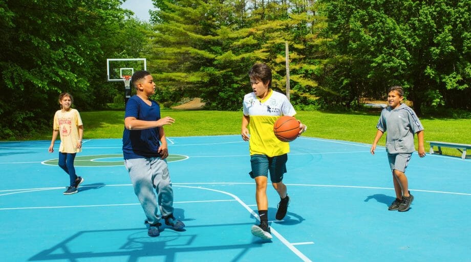 Boys playing basketball