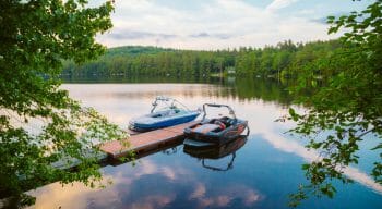 Motorboats at sunset on lake