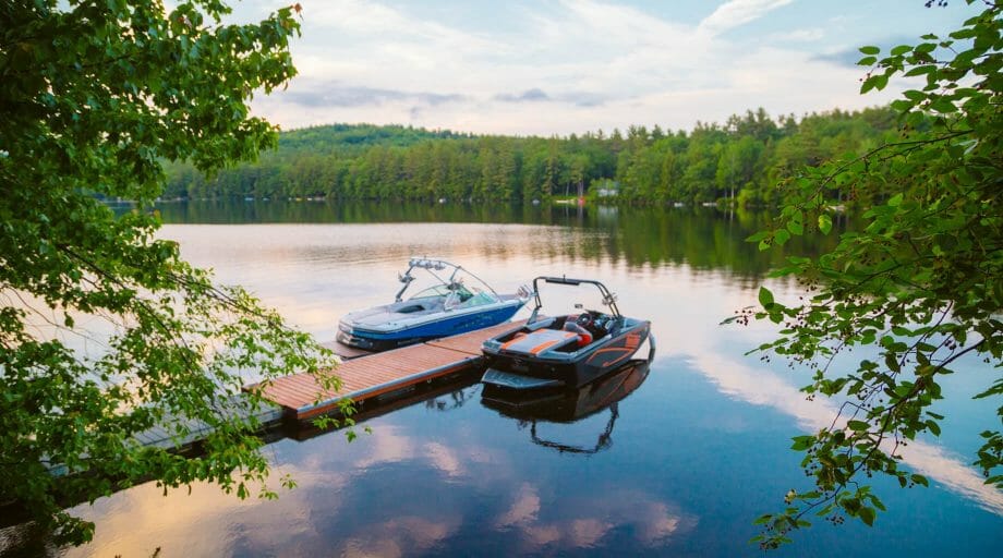 Motorboats at sunset on lake
