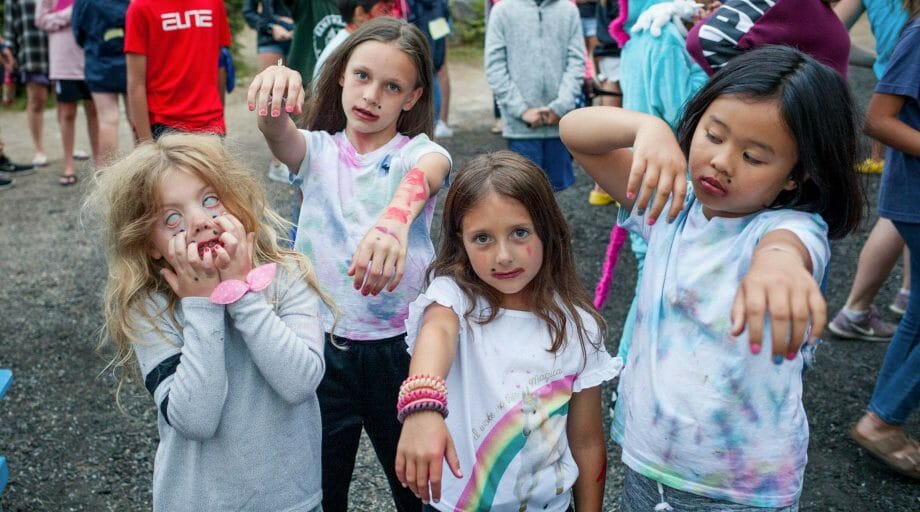 Four young girls dressed up like zombies