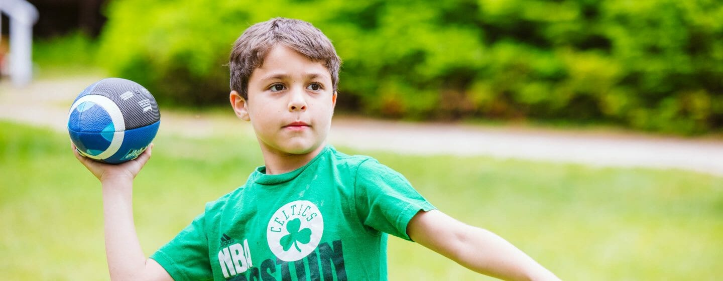 Camper playing football