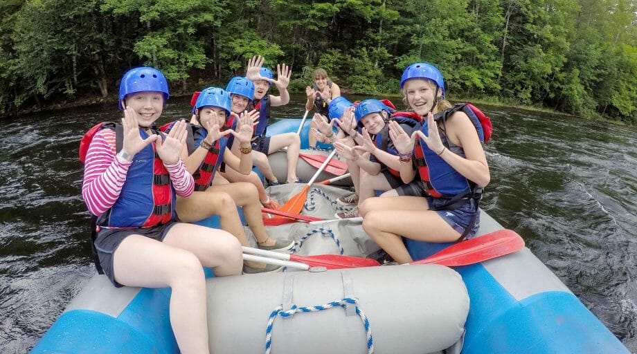 Campers rafting on an off-camp trip