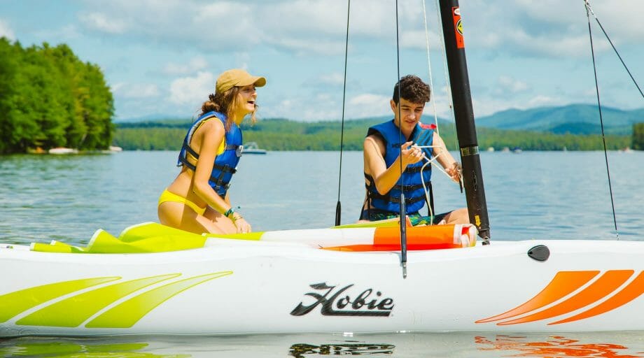 Staff and camper sailing