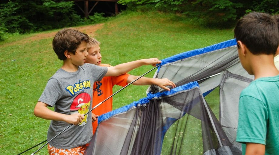 Campers setting up a tent