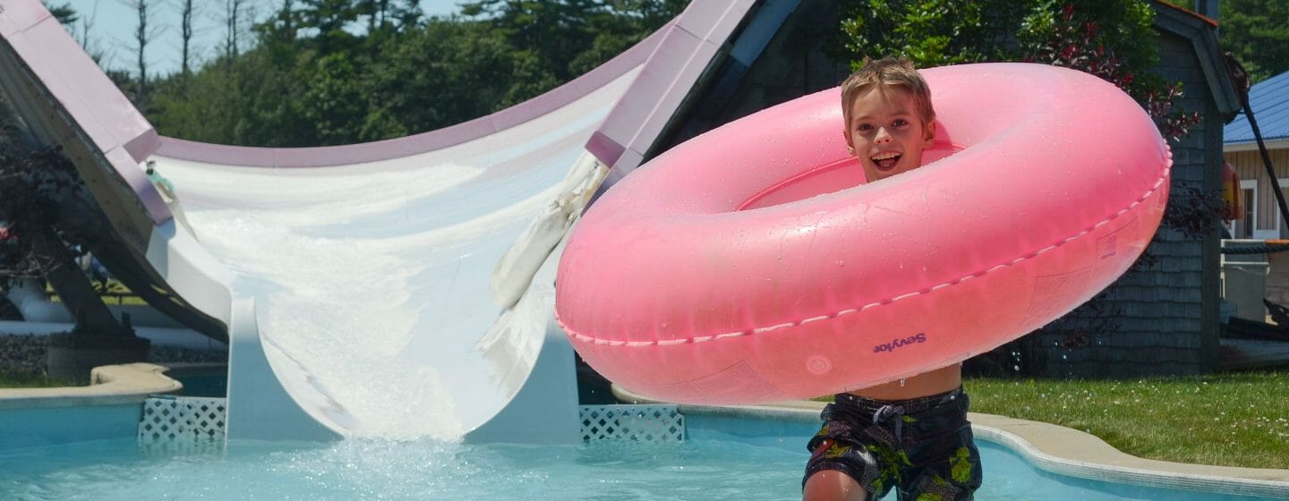 Boy on an off camp trip to a waterpark