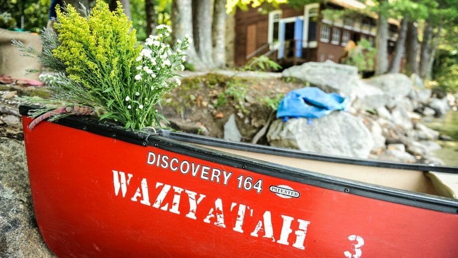 Wedding flowers decorating a canoe