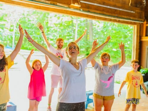 Group of campers dancing
