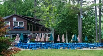 Dining hall and picnic tables set up outside