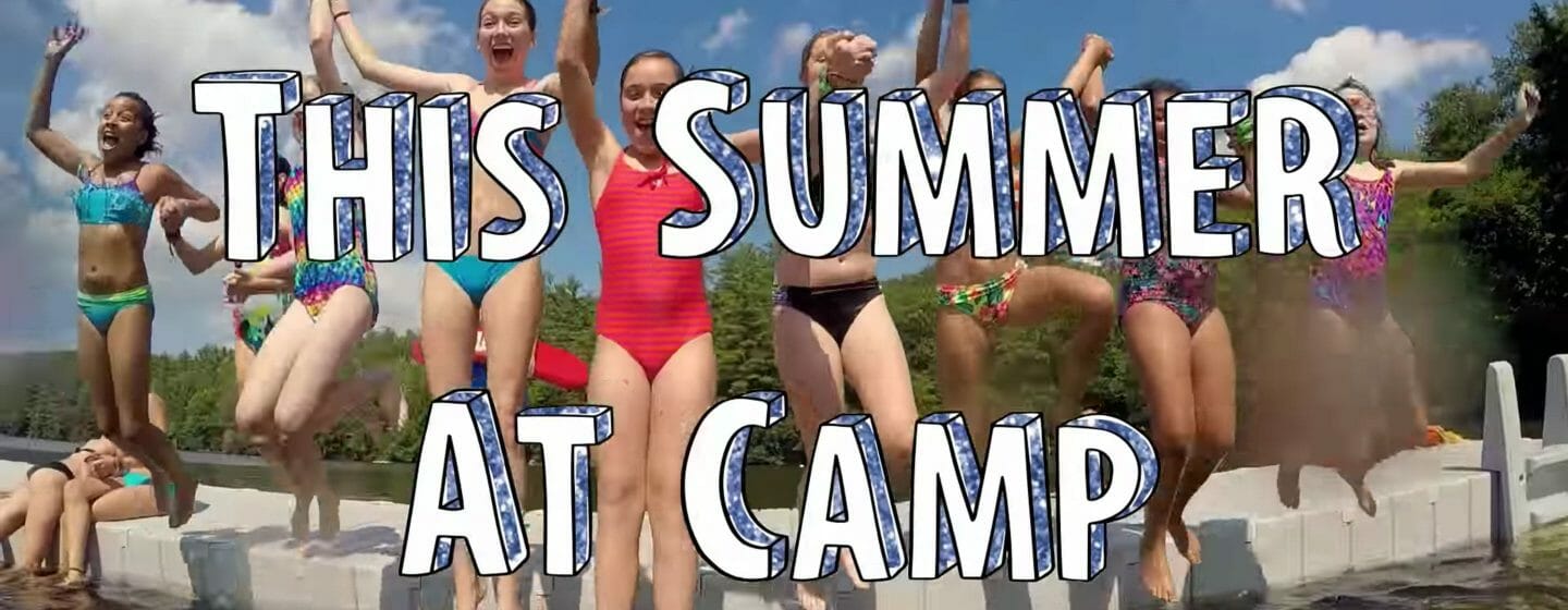Campers jumping into water during the Disney Bug Juice show